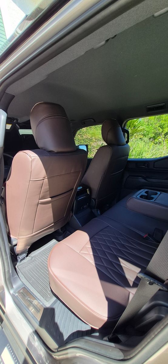 Tan rear seat covers in a minivan