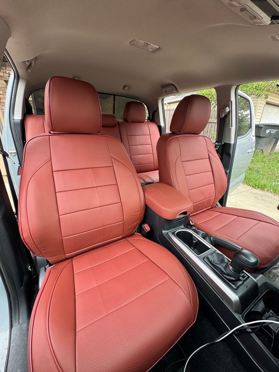 Tan front seat covers fitted in a customer vehicle