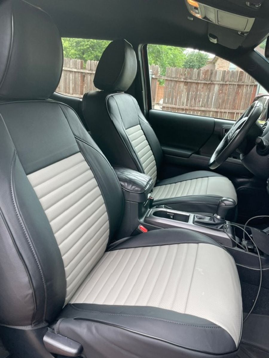 Black and grey seat covers in a Tacoma