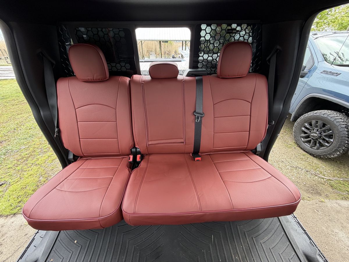 Tan rear seat covers fitted by a customer