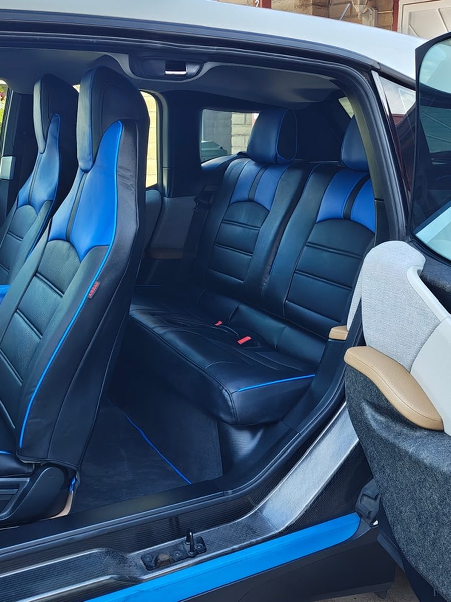 Black seat covers with blue accents