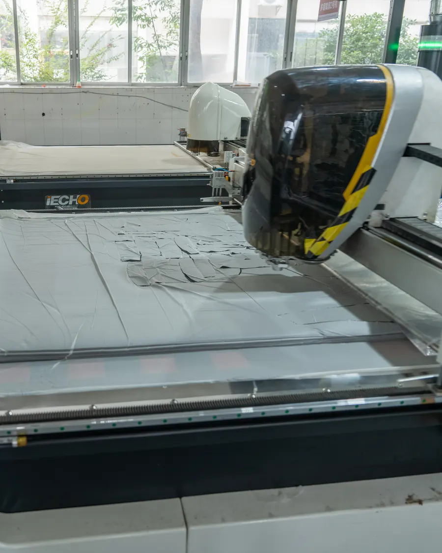 Computer-guided cutter cutting seat cover panels